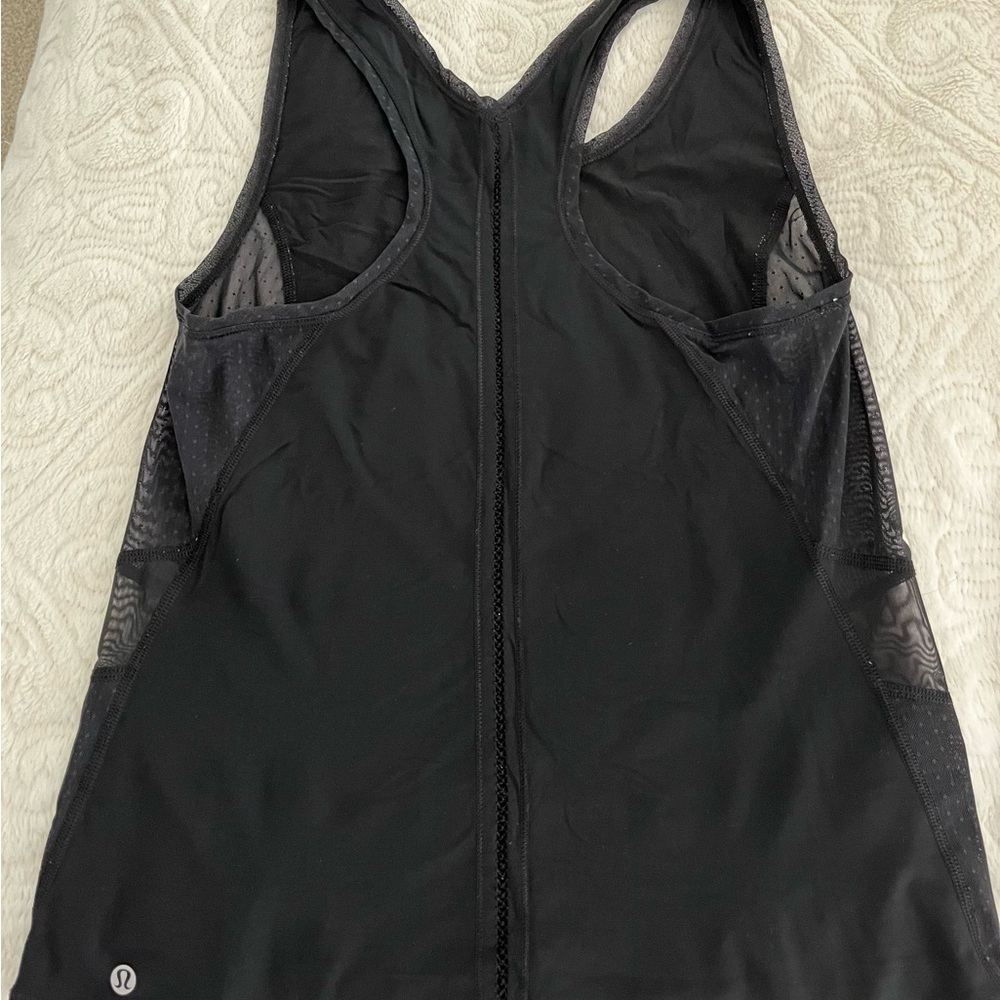 Lulu lemon work out top with mesh detail.  Size 8